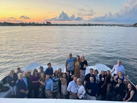 A group of employees posing for a photo.