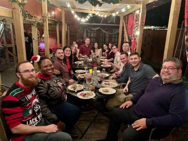 A group of employees having dinner.